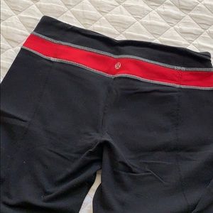 Lululemon size 6 black leggings with red waistband